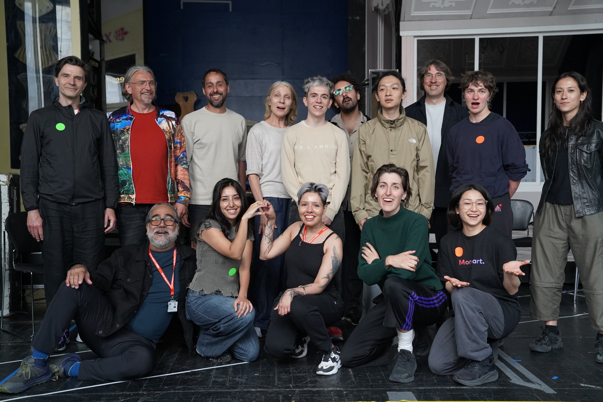 The group of participants and facilitators posed together in the studio.