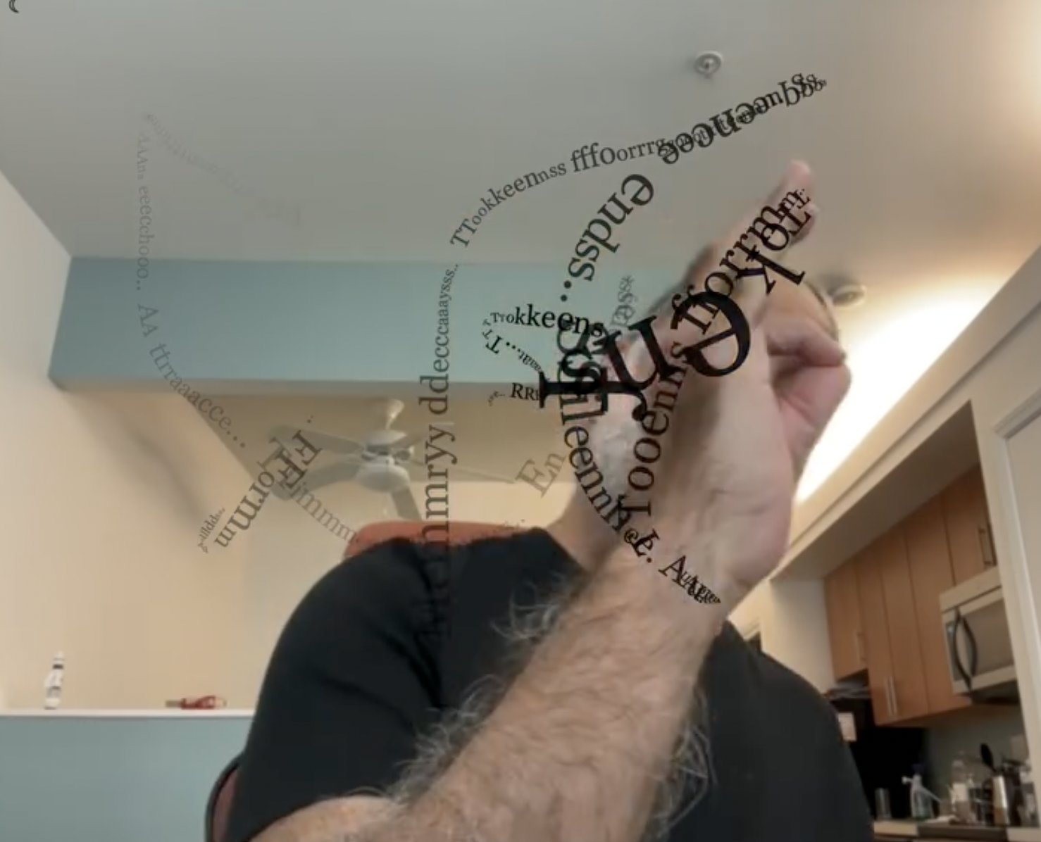 Machine Forgetting: a pinch gesture with curved letterforms gathered around the fingers.